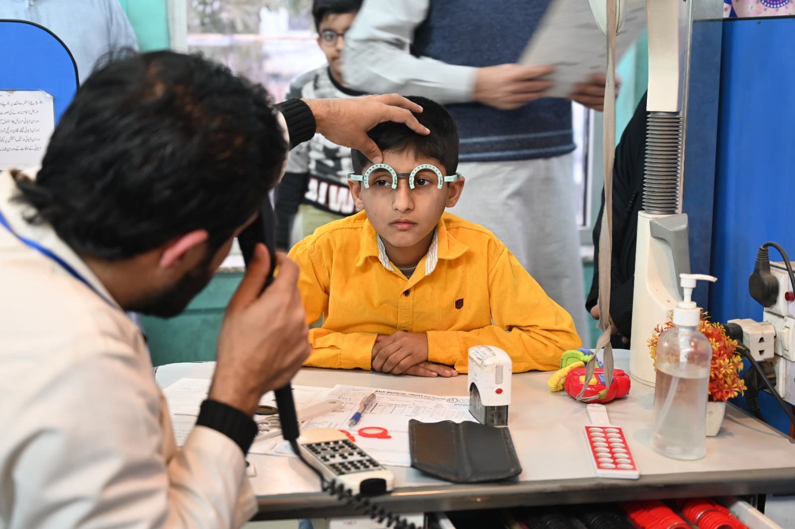 Young boy receiving a paediatric eye examination